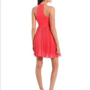 Aidan Aidan Mattox Halter Neck Sleeveless Pleated Trapeze Dress in Deep Coral